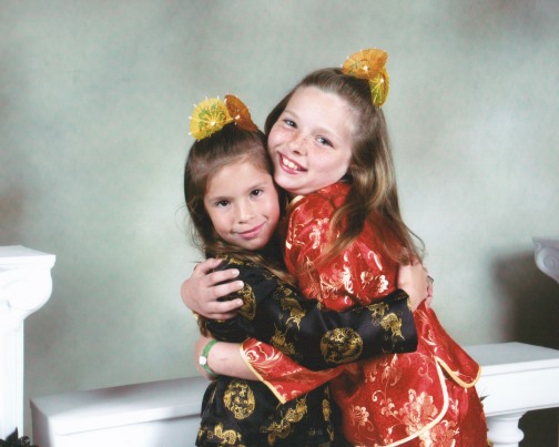 Holly-Kirsty-Hug SpiritCruise-Jan2005.jpg